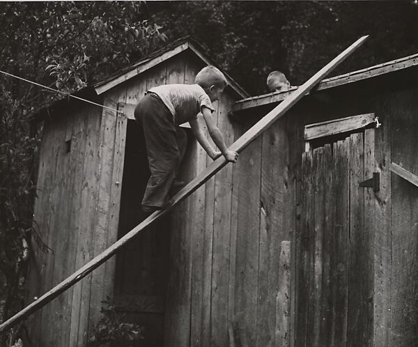 [Two boys: One Climbing a Board, One on a Fence], André Kertész (American (born Hungary), Budapest 1894–1985 New York), Gelatin silver print 