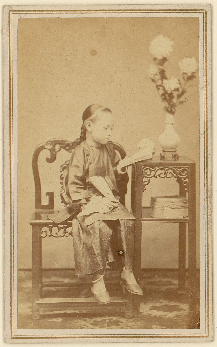 Girl Reading, 1870s. Albumen silver print