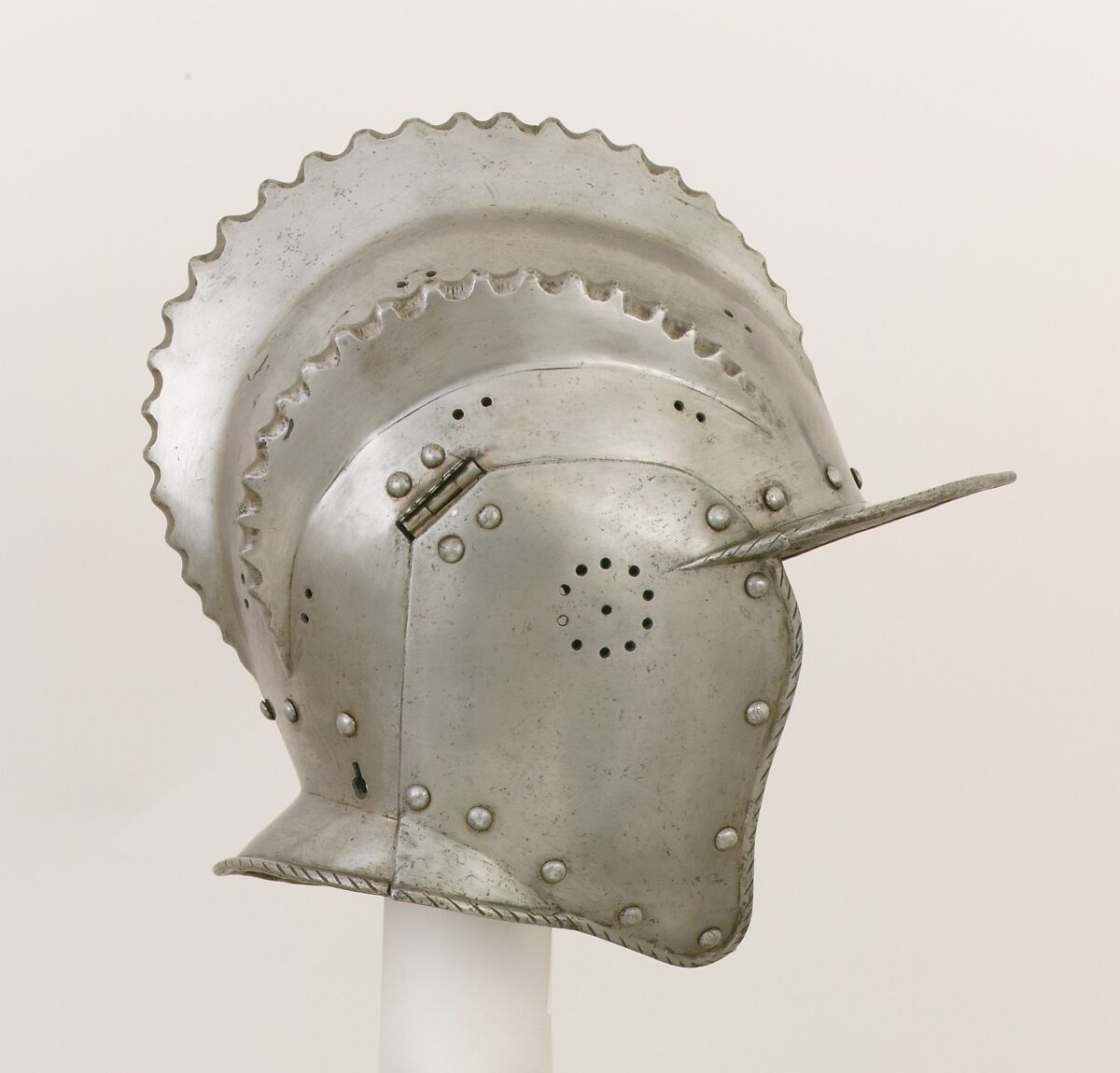 Burgonet, Replacement cheek-pieces made by Leonard Heinrich (American (born Germany) Munich 1900–1966 Clarksville, New Jersey)  ,  in The Metropolitan Museum of Art, Armor Workshop, Steel, leather, German, Augsburg