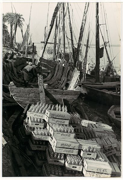 [Cases of Coca-Cola Bottles on Bank of River, with Sailing Vessels], Henri Cartier-Bresson (French, Chanteloup-en-Brie 1908–2004 Montjustin), Gelatin silver print 