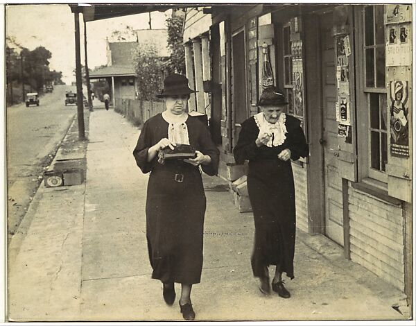 [Street Scene, Natchez, Mississippi: Two Women Walking along Sidewalk before Storefront], Ben Shahn (American (born Lithuania), Kaunas 1898–1969 New York), Gelatin silver print 