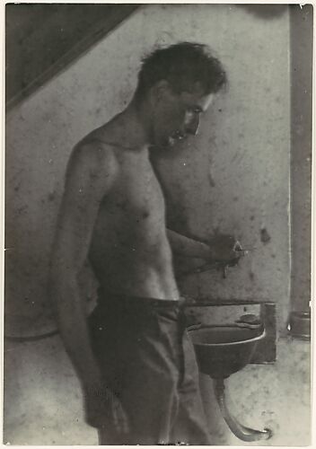 [Man at Sink]