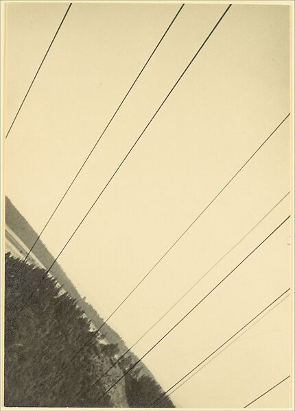 [Wooded Hills and Lake, Seen from above on a Diagonal through Suspended Bridge Cables (?)], Jaromír Funke (Czech, 1896–1945), Gelatin silver print 