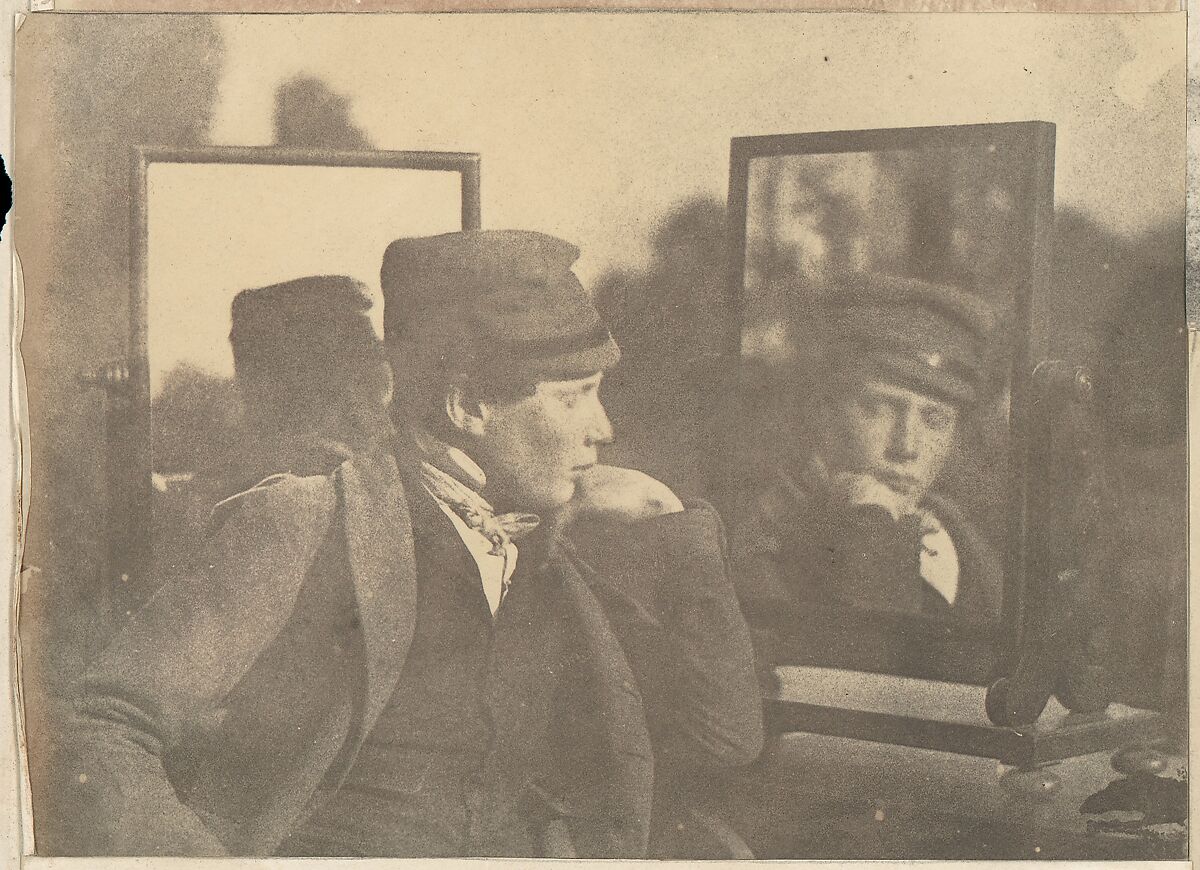 [Boy in Profile, Face Shown Frontally in Mirror], Unknown (British), Salted paper print from paper negative 