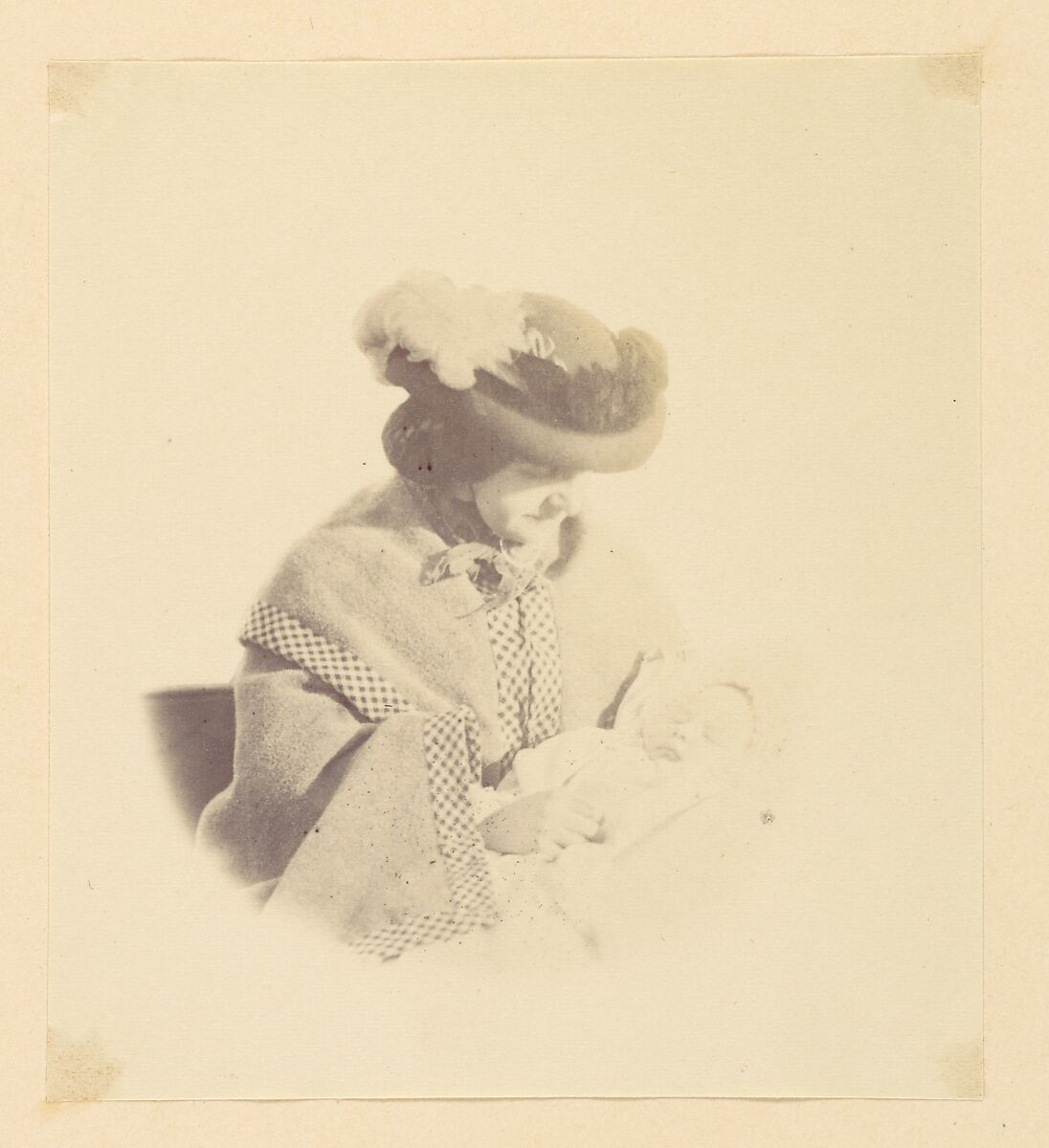 [Vignetted portrait, woman holding a baby], Alfred Capel Cure (British, 1826–1896), Albumen silver print from glass negative 