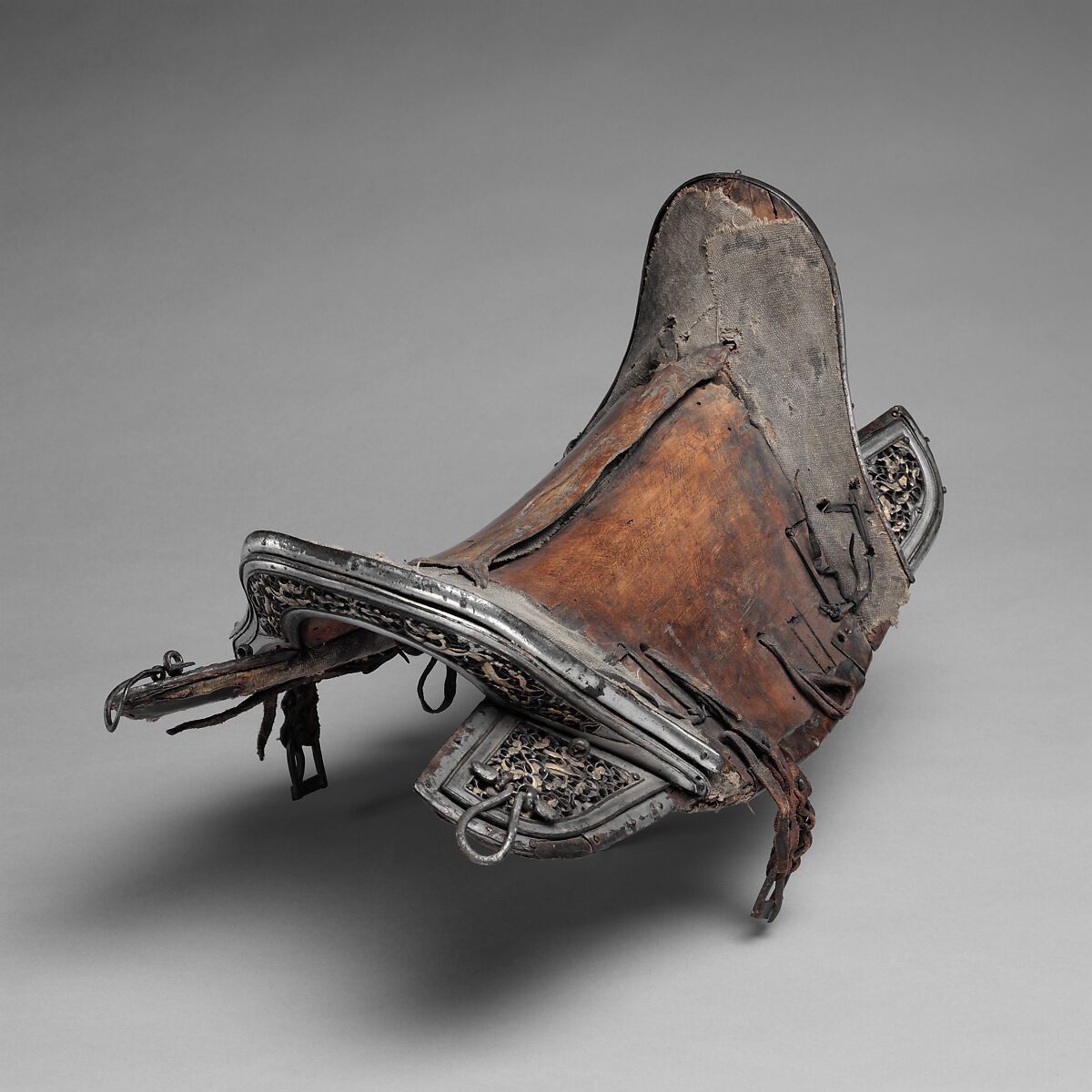 Saddle, Iron, gold, silver, copper, leather, wood, textile, Eastern Tibetan or Chinese