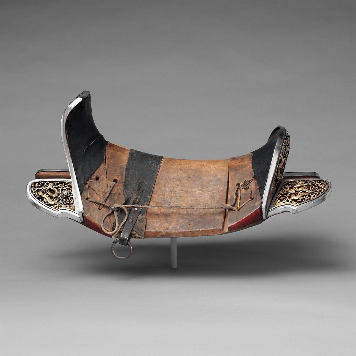 Saddle (<i>gser sga</i>), Iron, gold, silver, wood, leather, textile, Eastern Tibetan or Chinese for the Tibetan market