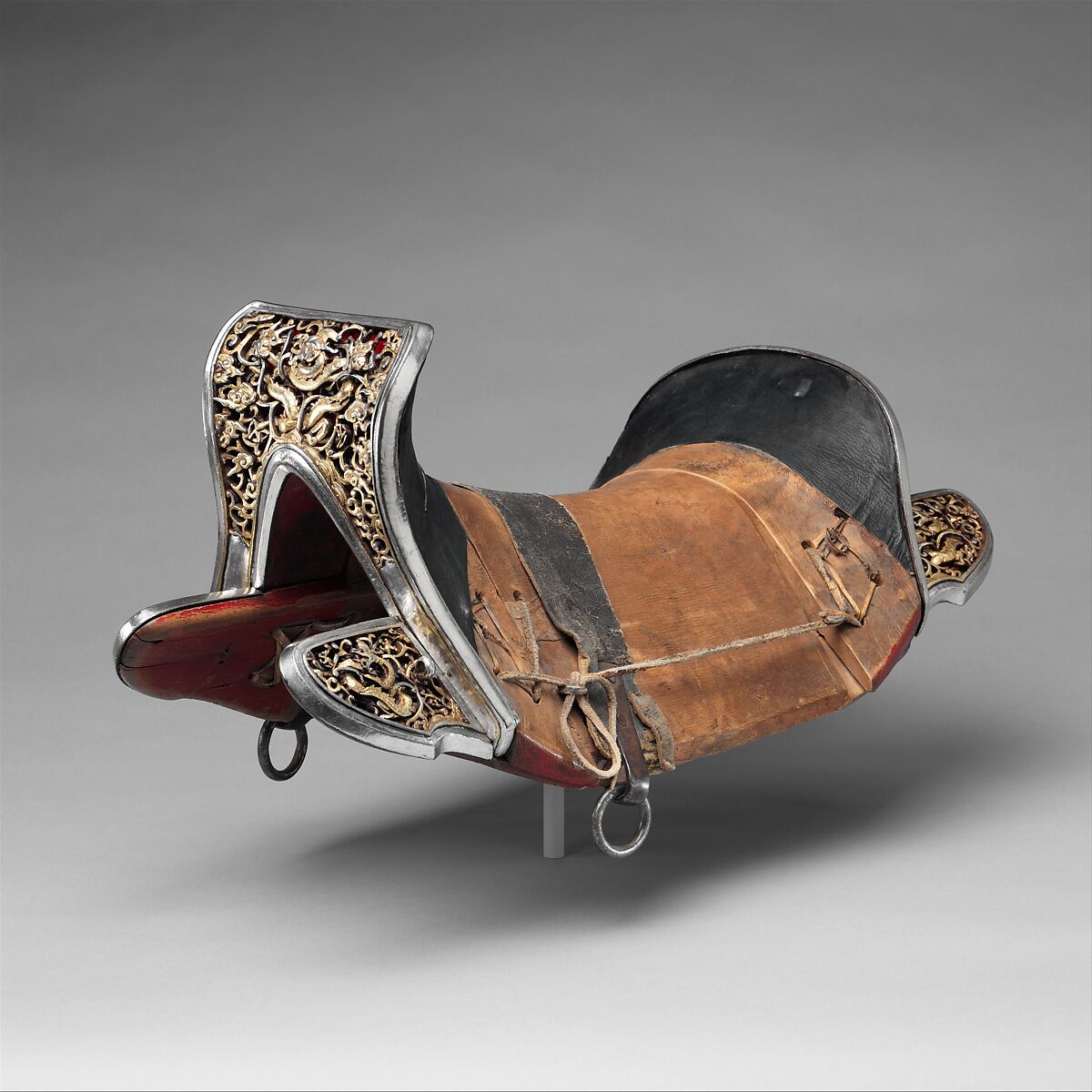 Saddle (<i>gser sga</i>), Iron, gold, silver, wood, leather, textile, Eastern Tibetan or Chinese for the Tibetan market 