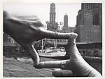 Hands Framing New York Harbor