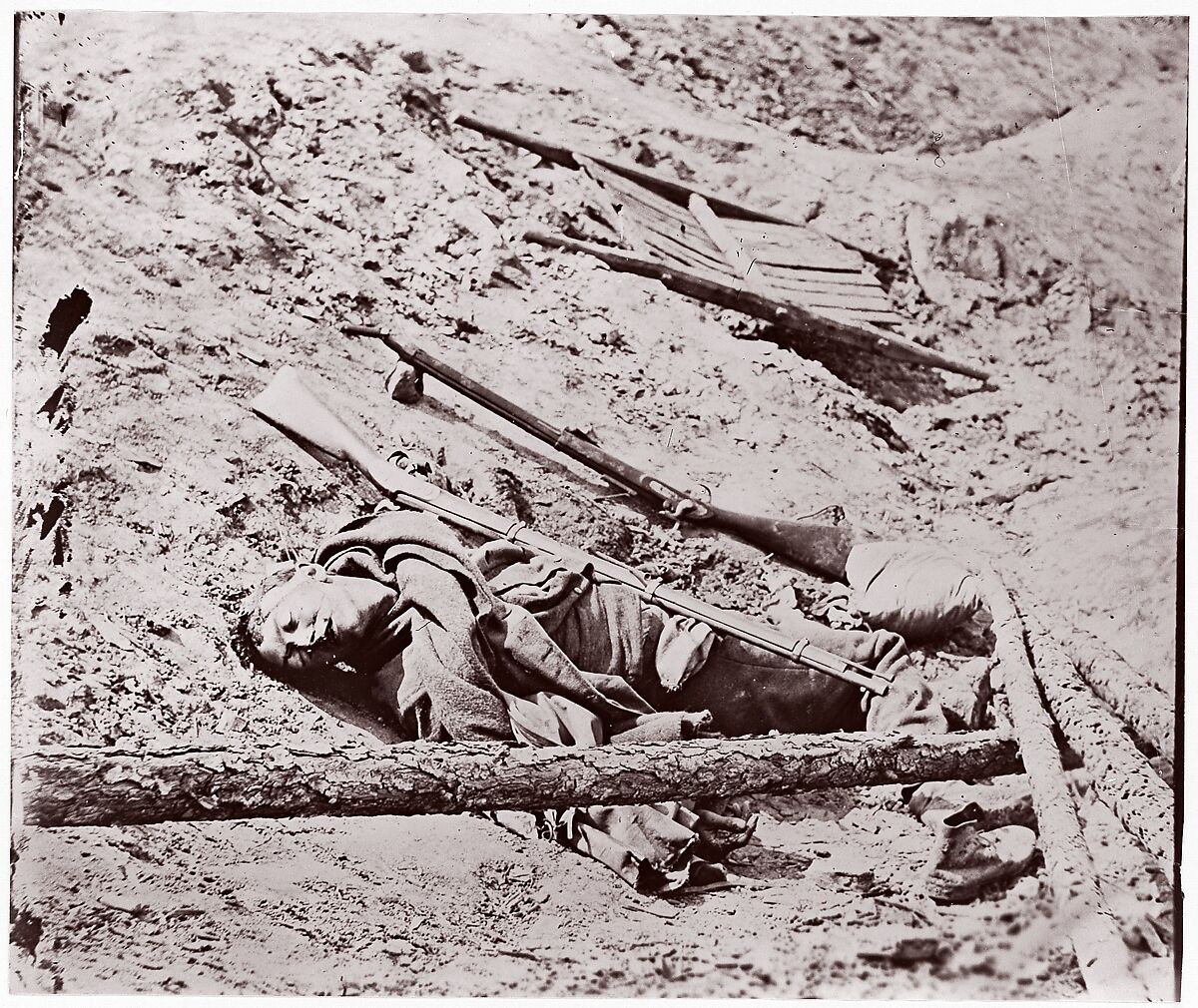 Dead Confederate Soldier at Fort Mahone, Petersburg, Thomas C. Roche (American, 1826–1895), Albumen silver print from glass negative 