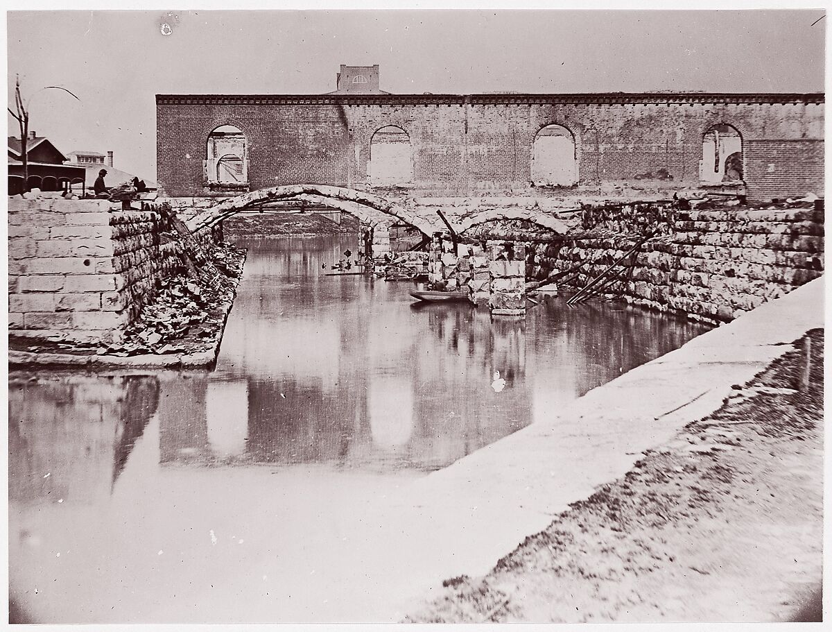 [Canal and Ruins of Richmond and Danville Railroad Depot, Richmond, Virginia], Attributed to Alexander Gardner (American, Glasgow, Scotland 1821–1882 Washington, D.C.), Albumen silver print from glass negative 
