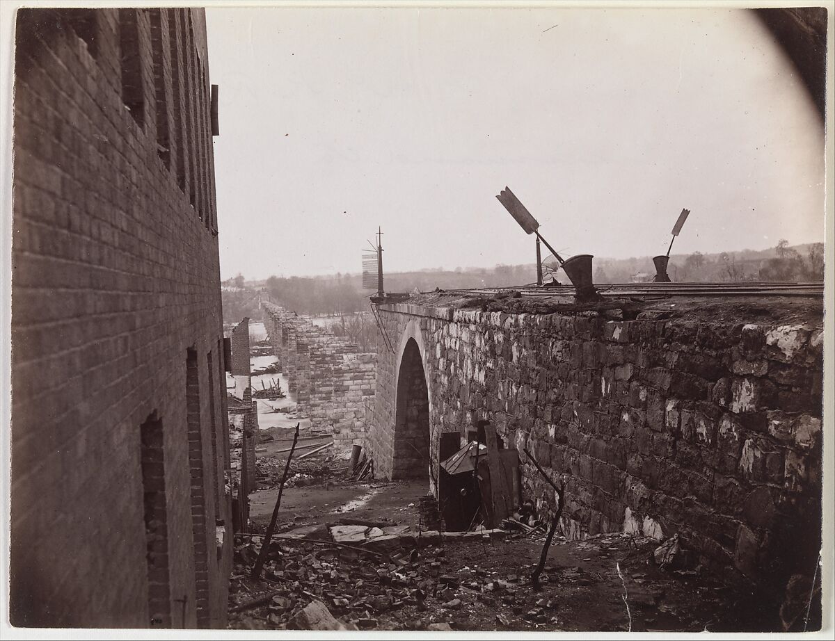 Ruins of Richmond & Petersburg Railroad Bridge, Richmond, Virginia, Alexander Gardner (American, Glasgow, Scotland 1821–1882 Washington, D.C.), Albumen silver print from glass negative 