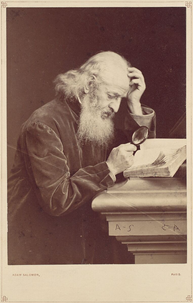 [Bearded Man with Magnifying Glass Examining a Manuscript], Antoine-Samuel Adam-Salomon (French, La Ferté-sous-Jouarre 1811–1881 Paris), Albumen silver print from glass negative 