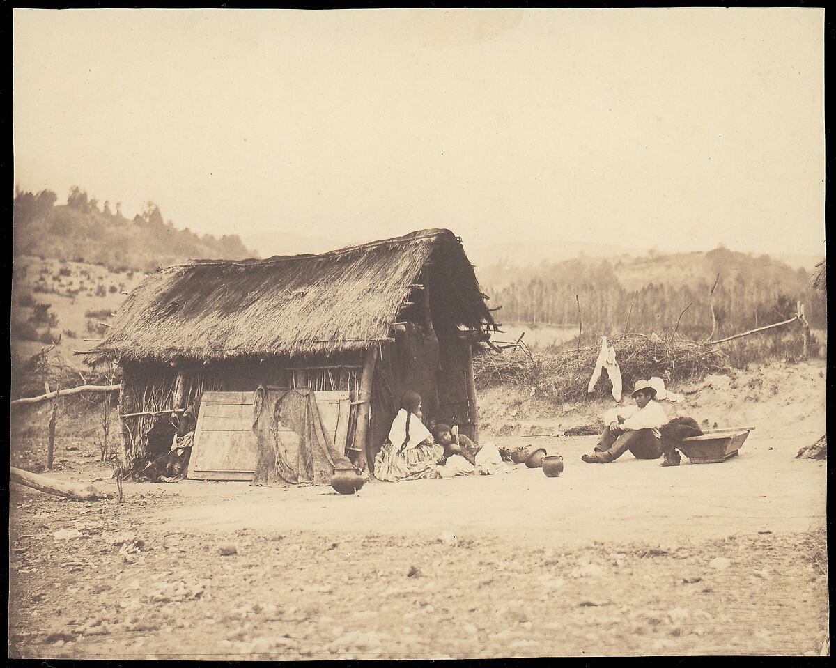 [Family Seated by Thatched Hut, South America], Unknown, Salted paper print from glass negative 