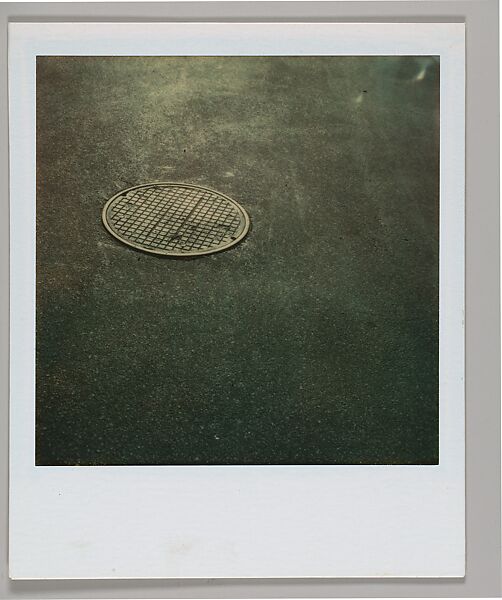 [Manhole Cover], Walker Evans (American, St. Louis, Missouri 1903–1975 New Haven, Connecticut), Instant internal dye diffusion transfer print (Polaroid SX-70) 