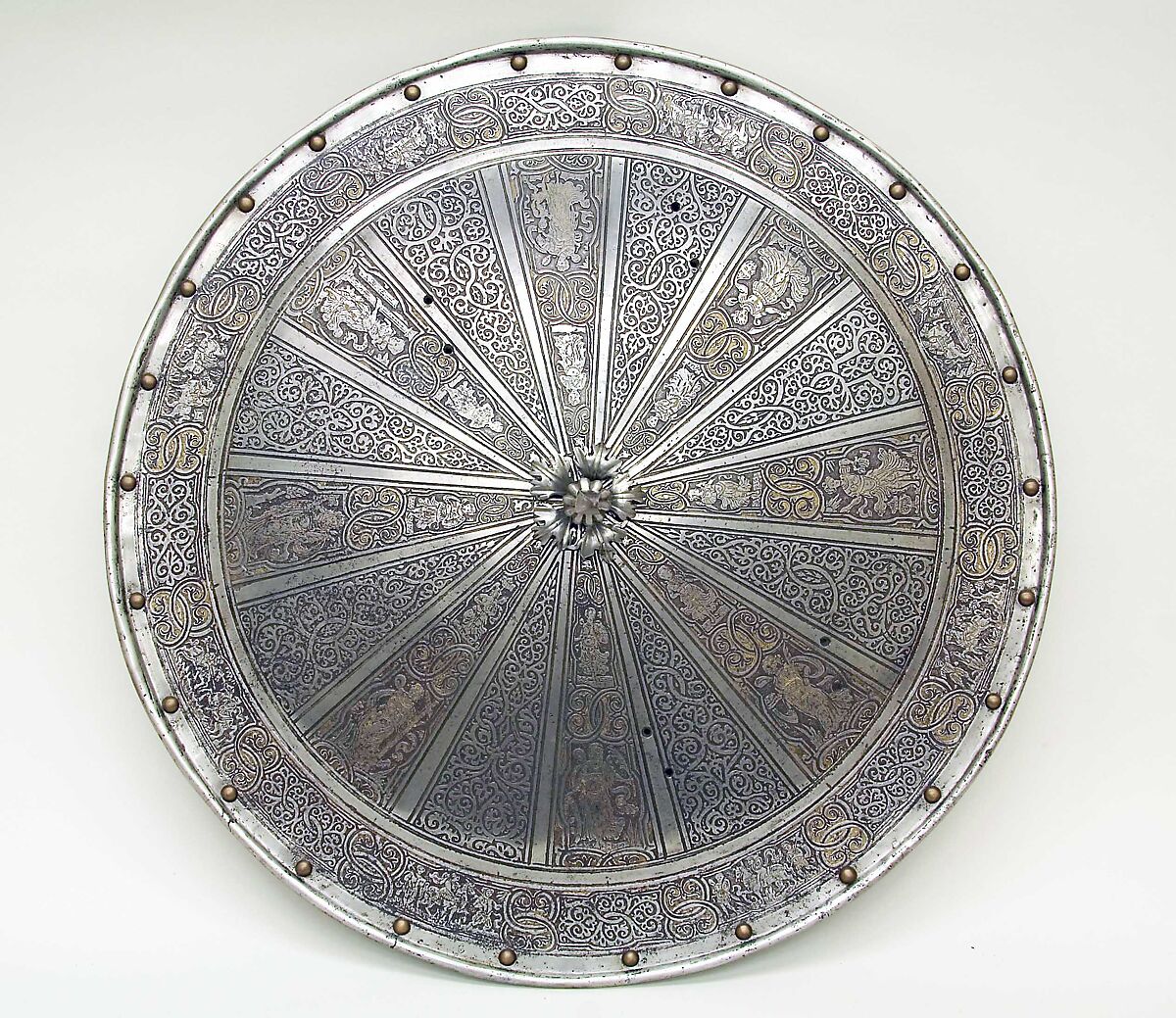 Shield, Etched and gilt steel, leather, Italian 