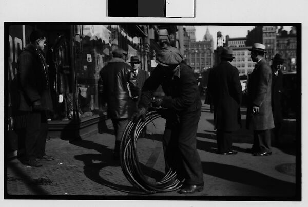 [Man Rolling Coiled Wire on Sidewalk, New York City], Walker Evans (American, St. Louis, Missouri 1903–1975 New Haven, Connecticut), Film negative 