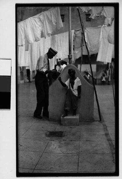 [Man at Communal Laundry in Courtyard, Havana], Walker Evans (American, St. Louis, Missouri 1903–1975 New Haven, Connecticut), Film negative 