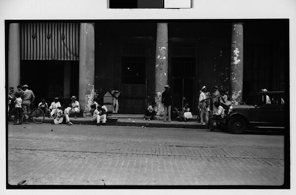 [Street Scene with Men Standing and Seated on Sidewalk, Havana], Walker Evans (American, St. Louis, Missouri 1903–1975 New Haven, Connecticut), Film negative 
