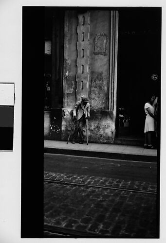 [Man on Crutches on Street, Havana]