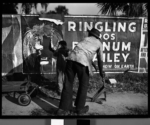 [Man and Child with Wagon in Front of Torn Circus Poster, Florida], Walker Evans (American, St. Louis, Missouri 1903–1975 New Haven, Connecticut), Film negative 