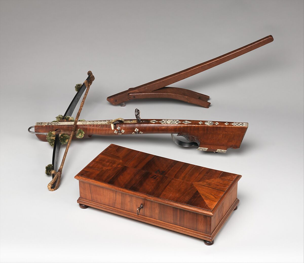 Light Crossbow (Schnepper) and Lever from the Armory of Moritzburg Castle, Steel, wood (walnut and possibly hornbeam), staghorn, horn, wool, silk, German, Dresden