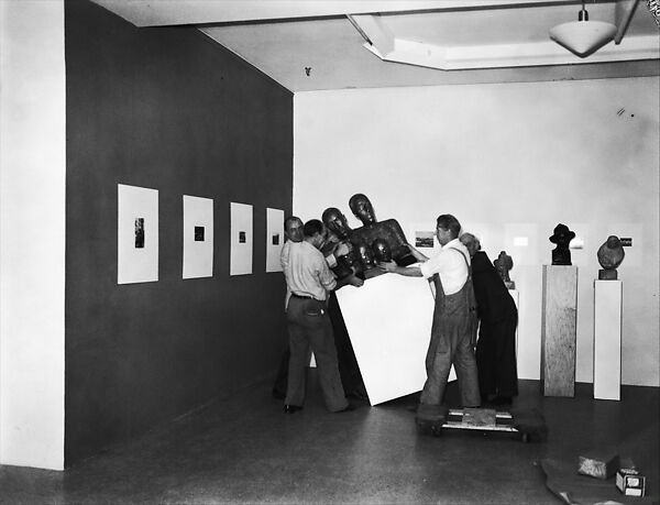 [Installation View of "Walker Evans: American Photographs"  Exhibition with Workmen Moving Sculpture, The Museum of Modern Art, New York City], Walker Evans (American, St. Louis, Missouri 1903–1975 New Haven, Connecticut), Film negative 