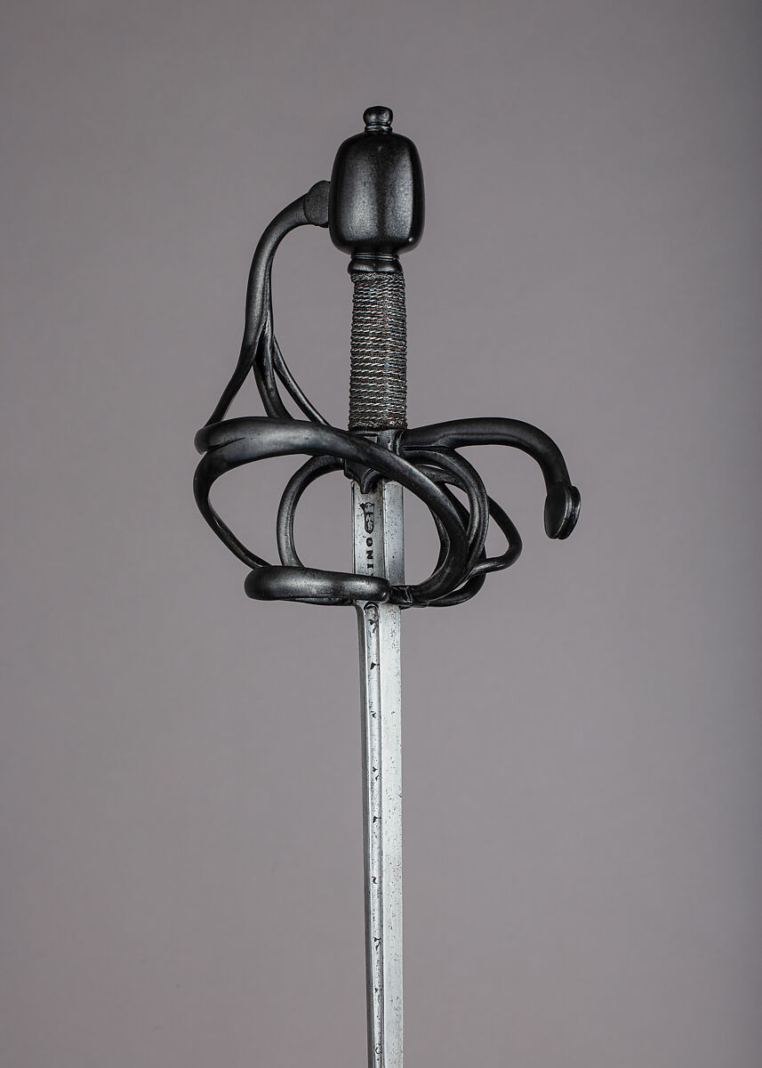 Rapier, Blade by Pietro Caino (Italian, Milan, active second half 16th century), Steel, wood, iron, hilt, probably German; blade, Italian, Milan