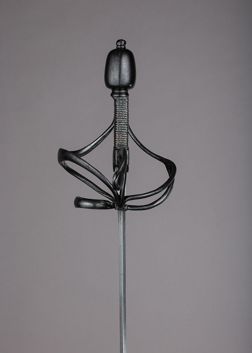 Rapier, Blade by Pietro Caino (Italian, Milan, active second half 16th century), Steel, wood, iron, hilt, probably German; blade, Italian, Milan