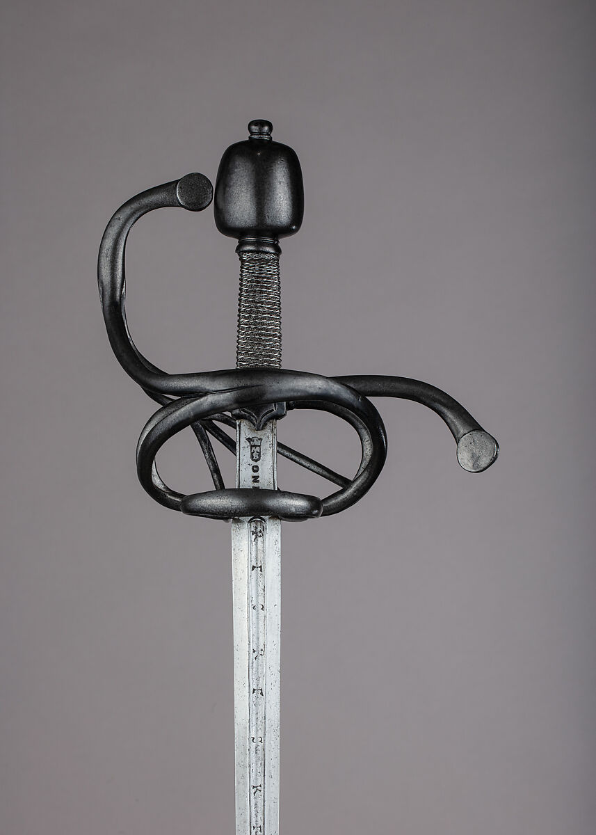 Rapier, Blade by Pietro Caino (Italian, Milan, active second half 16th century), Steel, wood, iron, hilt, probably German; blade, Italian, Milan 