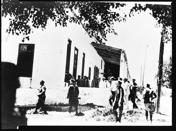 [Copy of Newspaper File Photograph: Crowd Scene with Armed Men in Foreground, Outside Building, Probably Havana], Walker Evans (American, St. Louis, Missouri 1903–1975 New Haven, Connecticut), Film negative