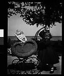 [Jane Beach Evans Pushing Walker Evans III in Baby Carriage, Gratiot Beach, Michigan]
