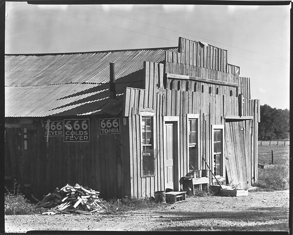 Walker Evans | [Wooden Farm Building with Ads for 666 Cold Remedy on ...