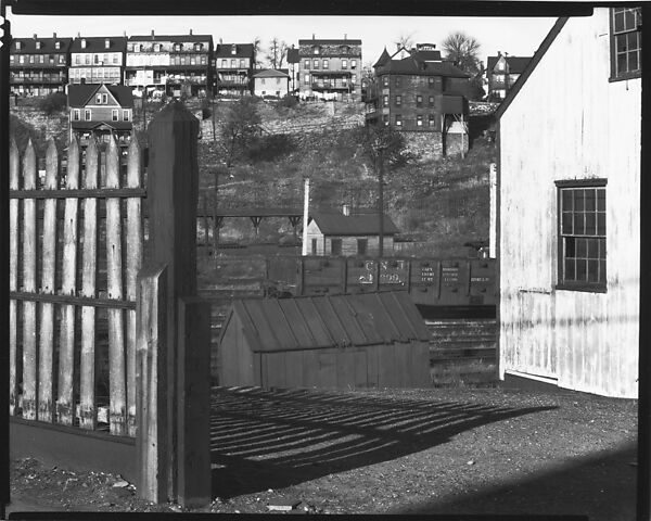 [Railroad Yard Below Workers' Houses with Wooden Fence and Barn in Foreground, Bethlehem, Pennsylvania or Philipsburg, New Jersey], Walker Evans (American, St. Louis, Missouri 1903–1975 New Haven, Connecticut), Film negative 