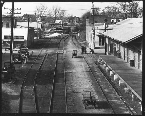 [Railroad Tracks Through Town with Parked Cars and Depot on Either Side, Edwards, Mississippi], Walker Evans (American, St. Louis, Missouri 1903–1975 New Haven, Connecticut), Film negative 