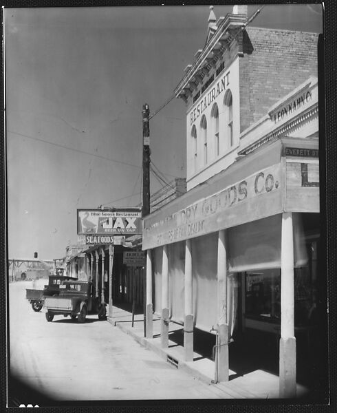 [Oblique View of Main Street Shopfronts and Parked Cars, Morgan City, Louisiana], Walker Evans (American, St. Louis, Missouri 1903–1975 New Haven, Connecticut), Film negative 