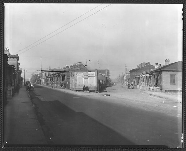 [Fork in Road with Two Rows of Wooden Houses and People on Corner, Savannah or Augusta, Georgia], Walker Evans (American, St. Louis, Missouri 1903–1975 New Haven, Connecticut), Film negative 