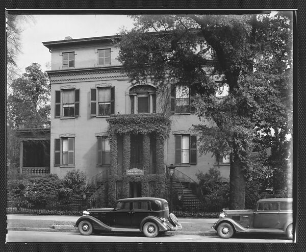 [Brick Greek Revival Building with Ivy-Covered Entry Porch and Parked Cars in Foreground, Funeral Home, Augusta, Georgia], Walker Evans (American, St. Louis, Missouri 1903–1975 New Haven, Connecticut), Film negative 