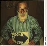 [Walker Evans Holding Arrow Sign], Gay Burke (American, Dallas, Texas 1946–2017 Tuscaloosa, Alabama), Instant internal dye diffusion transfer print (Polaroid SX-70)
