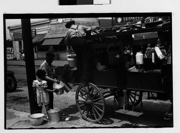 [Two 35mm Film Frames: Horse-Drawn Houseware Vendor's Cart Before Food Stands, New York City], Walker Evans (American, St. Louis, Missouri 1903–1975 New Haven, Connecticut), Film negative 