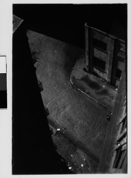 [Three 35mm Film Frames: View from Window of Corner Building and Cobblestone Street, Brooklyn?, New York], Walker Evans (American, St. Louis, Missouri 1903–1975 New Haven, Connecticut), Film negative