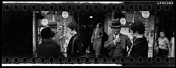 [Two 35mm Film Frames: Man and Two Women in Conversation on Street Outside Newberry's, New York City?], Walker Evans (American, St. Louis, Missouri 1903–1975 New Haven, Connecticut), Film negative