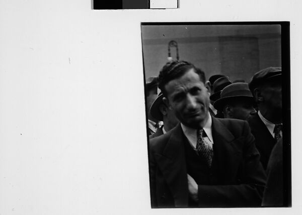 [Three 35mm Film Frames: Man and Policeman in Conversation Outside Watch Repair Shop, Partial View of Man on Street Looking at Camera, Policeman on Street Outside Watch Repair Shop, New York City], Walker Evans (American, St. Louis, Missouri 1903–1975 New Haven, Connecticut), Film negative