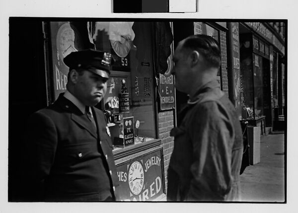 [Three 35mm Film Frames: Man and Policeman in Conversation Outside Watch Repair Shop, Partial View of Man on Street Looking at Camera, Policeman on Street Outside Watch Repair Shop, New York City], Walker Evans (American, St. Louis, Missouri 1903–1975 New Haven, Connecticut), Film negative 
