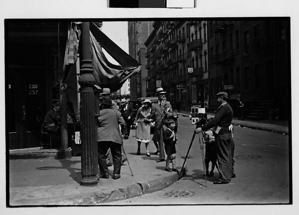 [Two 35mm Film Frames: Tintype Photographer and Group on Street Corner, New York City]