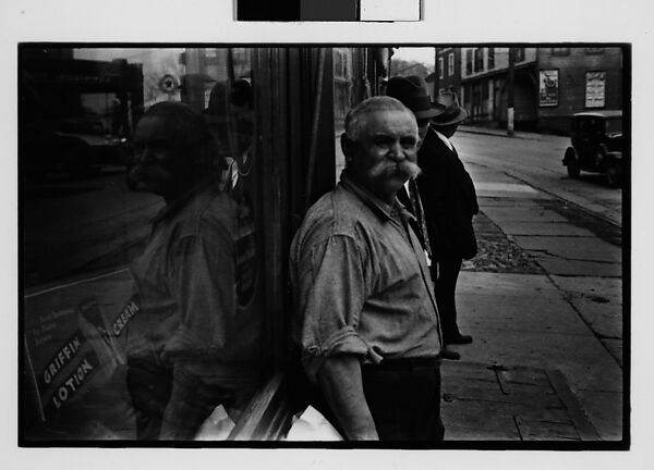 [Three 35mm Film Frames: Shopkeeper with Broom on Sidewalk, Man with Handlebar Moustache on Sidewalk, Ossining, New York], Walker Evans (American, St. Louis, Missouri 1903–1975 New Haven, Connecticut), Film negative