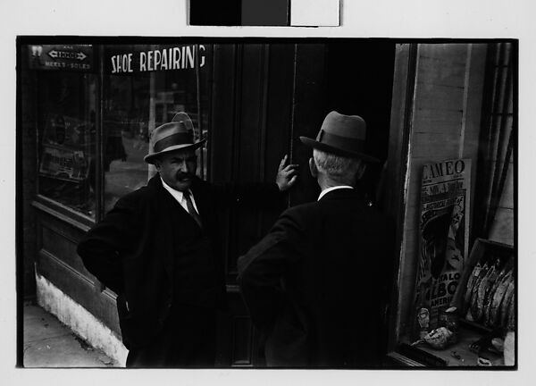 [Three 35mm Film Frames: Two Men in Conversation Outside Shoe Repair Shop, Ossining, New York], Walker Evans (American, St. Louis, Missouri 1903–1975 New Haven, Connecticut), Film negative 