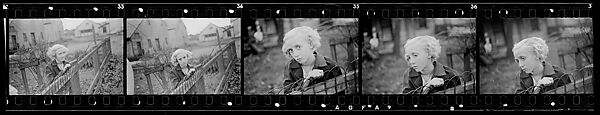 [Five 35mm Film Frames: Girl Leaning on Wire Fence in Yard, Vicinity Bethlehem, Pennsylvania], Walker Evans (American, St. Louis, Missouri 1903–1975 New Haven, Connecticut), Film negative