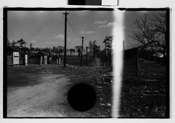 [Five 35mm Film Frames: Wooden Shacks on Dirt Road, Roadside Building with Painted Billboard of Franklin Delano Roosevelt on Roof, Southeastern U.S.], Walker Evans (American, St. Louis, Missouri 1903–1975 New Haven, Connecticut), Film negative
