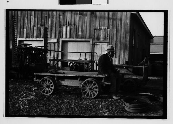 [Five 35mm Film Frames: Man in Front of Movie Poster, Man Seated on Flatbed Wagon in Yard, Vicksburg or New Orleans], Walker Evans (American, St. Louis, Missouri 1903–1975 New Haven, Connecticut), Film negative